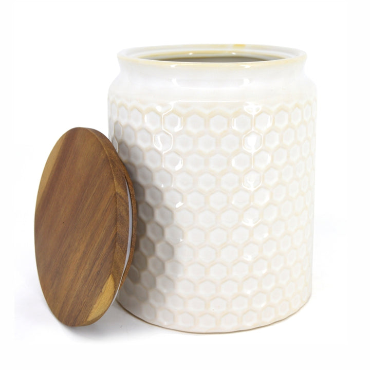 2.9L stoneware storage container with acacia wood lid featuring a textured honeycomb pattern for a modern farmhouse aesthetic feel.