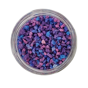 Bright blue and purple sprinkles in a glass jar