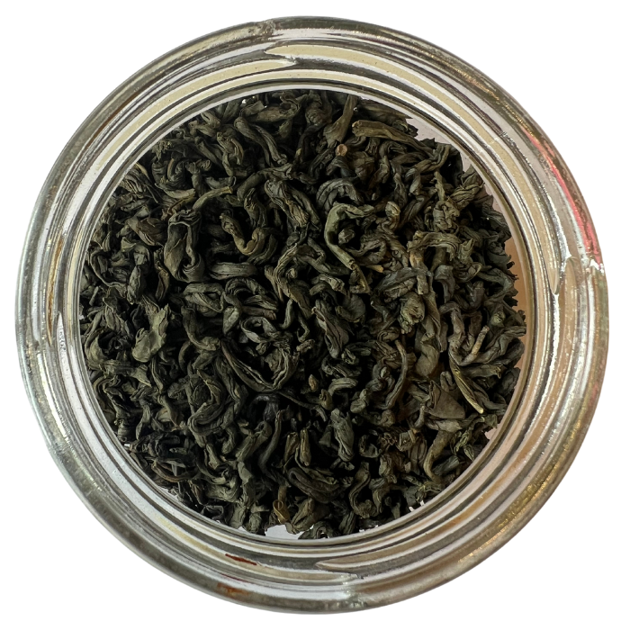 Jasmine golden dragon tea in a glass jar with a white background