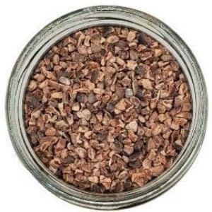 Cocoa Nibs in a jar with a white background