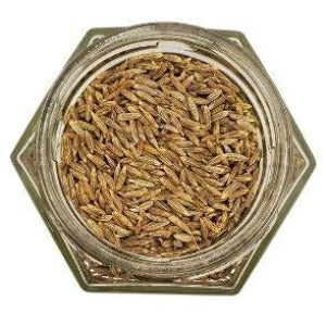 Cumin Seeds Whole in a jar with a white background