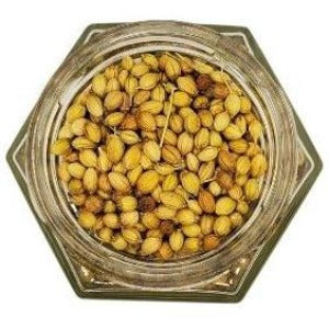 Coriander Seeds Organic in a jar with a white back background