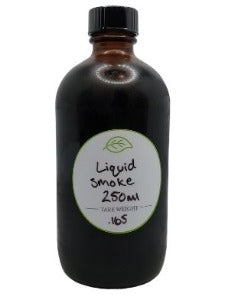 Liquid Smoke, housed in a sleek bottle, emanates a rich and smoky essence. The dark, aromatic fluid promises to infuse dishes with the authentic flavor of slow-smoked perfection. With a convenient pour spout, this culinary gem offers a tantalizing smokiness, elevating your favorite recipes with the essence of a traditional barbecue without the need for outdoor grilling.